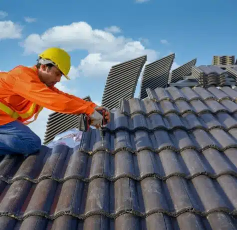 Male,Roof,Installer,Construction,Workers,On,The,Roof,Working,Use