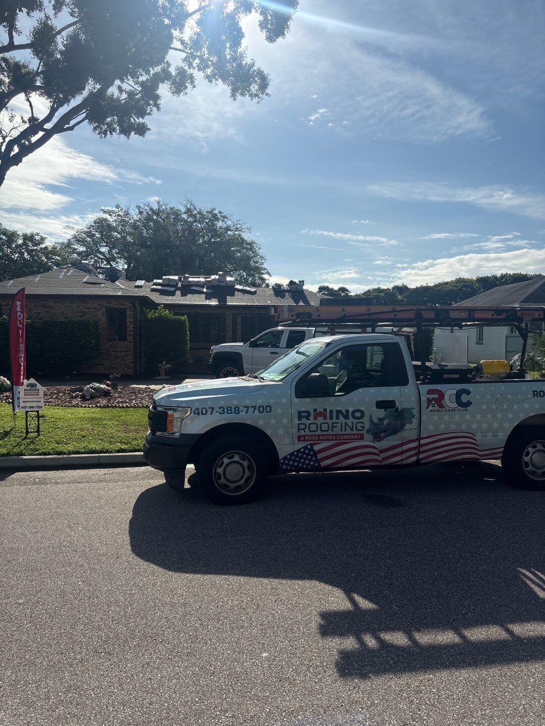 Rhino Roofing truck at a roof replacement job in Orange County, FL