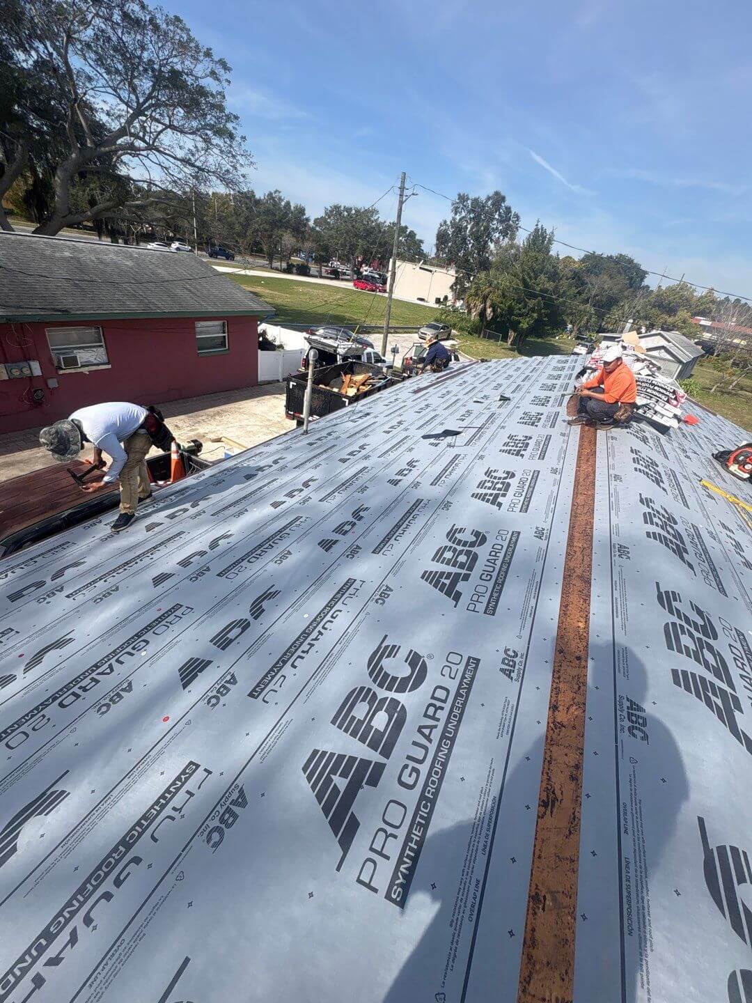 Roof replacement with synthetic underlayment by Rhino Roofing